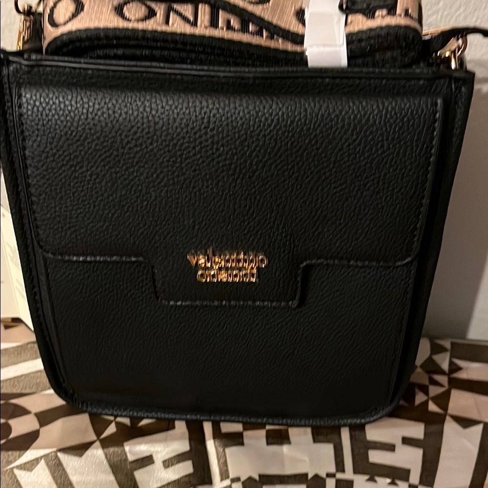 Valentino Black and Gold Crossbody Bag with Flap Closure
